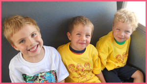 boys on a school bus getting ready for a field trip with Whitehaven Kindergarten School Age Centre